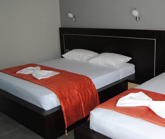 Imagen de la habitación del Hotel Lion Gate. Foto 10