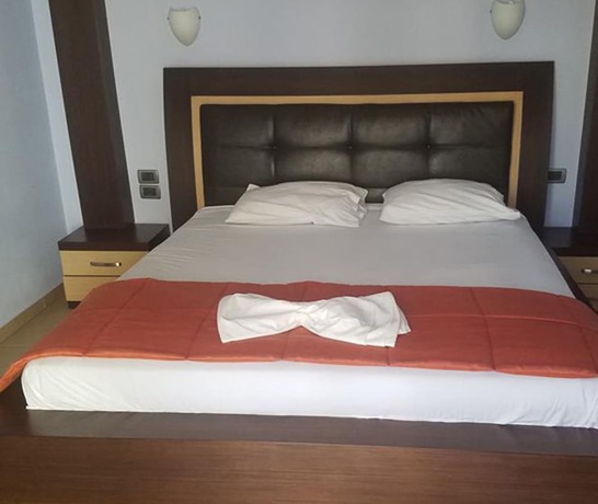 Imagen de la habitación del Hotel Lion Gate. Foto 11