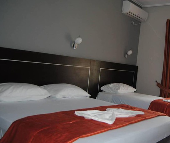 Imagen de la habitación del Hotel Lion Gate. Foto 12
