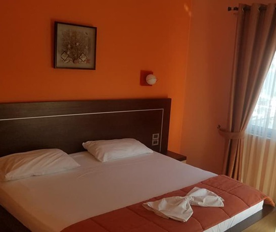 Imagen de la habitación del Hotel Lion Gate. Foto 14