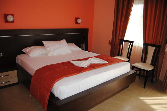 Imagen de la habitación del Hotel Lion Gate. Foto 15
