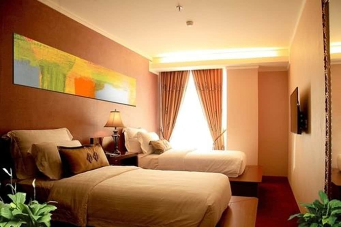 Imagen de la habitación del Hotel Lion and Plaza. Foto 2