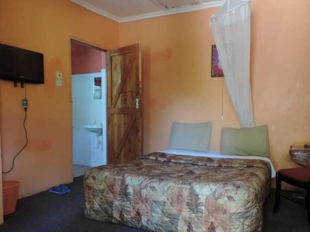 Imagen de la habitación del Hotel Lions Court Lodge. Foto 18