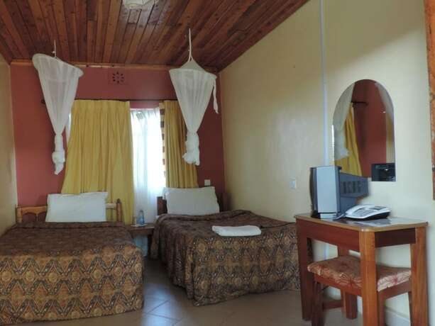 Imagen de la habitación del Hotel Lions Court Lodge. Foto 20