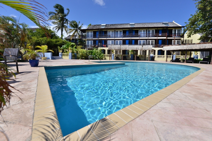 Imagen de la piscina del Hotel Lionsdive Beach Resort. Foto 16