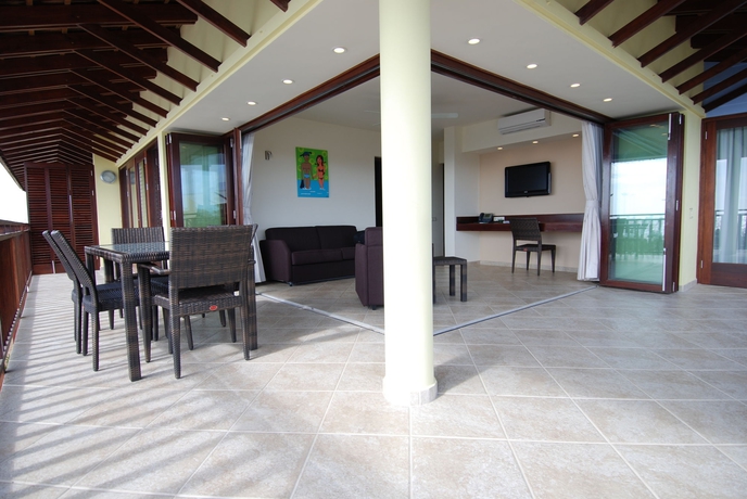 Imagen de la habitación del Hotel Lionsdive Beach Resort. Foto 4