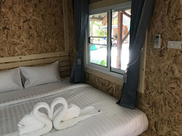 Imagen de la habitación del Hotel Lipe Garden Beach Resort. Foto 25