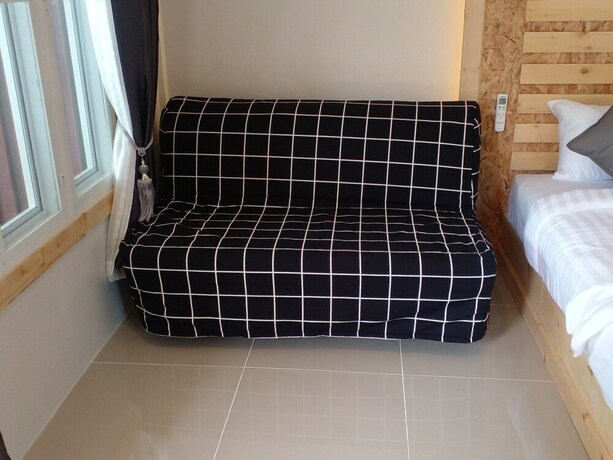 Imagen de la habitación del Hotel Lipe Garden Beach Resort. Foto 29