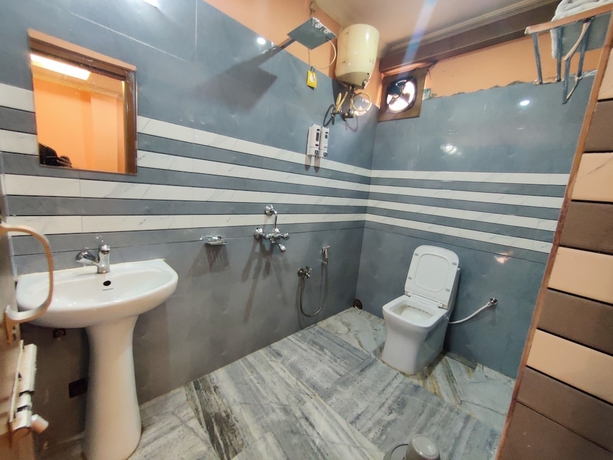 Imagen de la habitación del Hotel Lisa Guest House. Foto 4