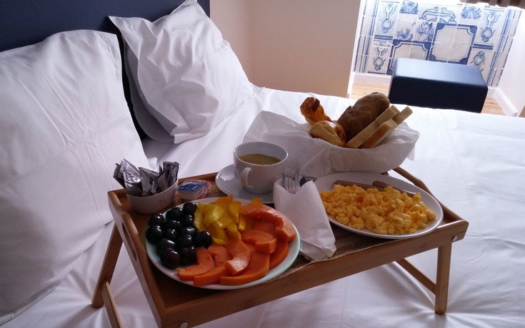 Imagen de la habitación del Hotel Lisbon Arsenal Suites. Foto 4