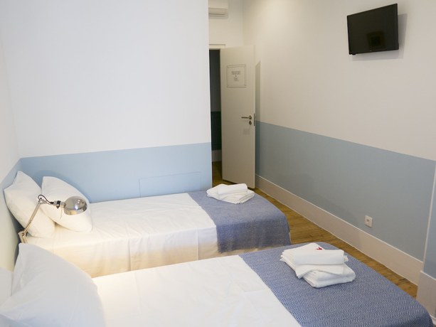 Imagen de la habitación del Hotel Lisbon Check-In Guesthouse. Foto 14