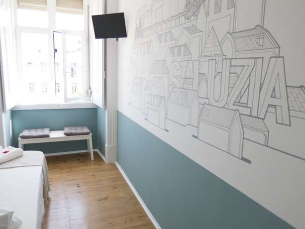 Imagen de la habitación del Hotel Lisbon Check-In Guesthouse. Foto 18
