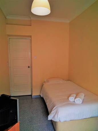 Imagen de la habitación del Hotel Lisbon Suite Home. Foto 9