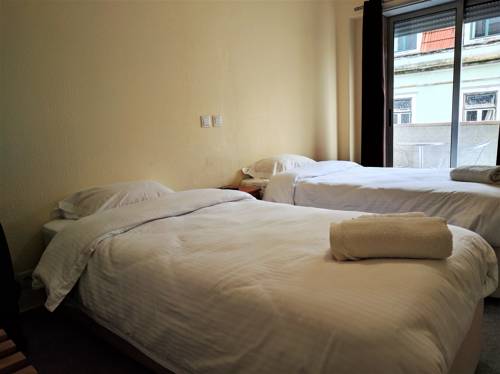 Imagen de la habitación del Hotel Lisbon Suite Home. Foto 11