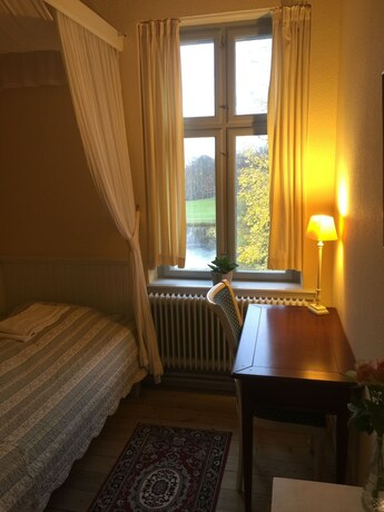 Imagen de la habitación del Hotel Liselund Ny Slot. Foto 22