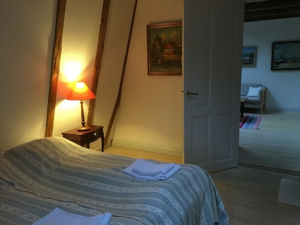 Imagen de la habitación del Hotel Liselund Ny Slot. Foto 23