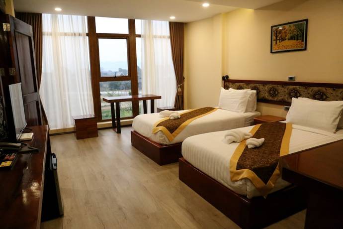 Imagen de la habitación del Hotel Lisha Grand Hotel. Foto 17