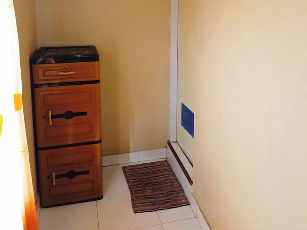 Imagen de la habitación del Hotel Lishafa Homestay. Foto 5