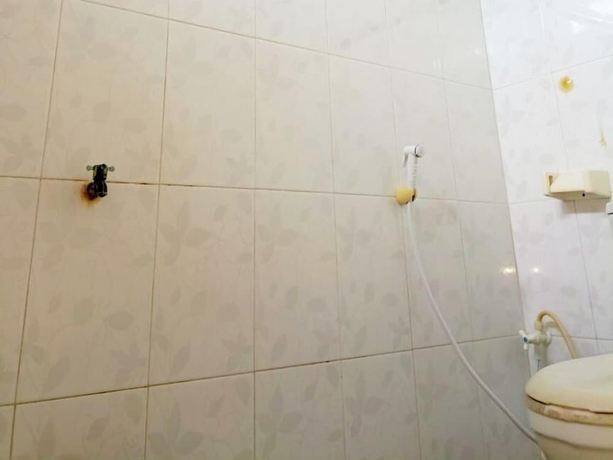 Imagen de la habitación del Hotel Lishafa Homestay. Foto 11
