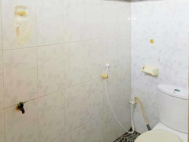 Imagen de la habitación del Hotel Lishafa Homestay. Foto 13