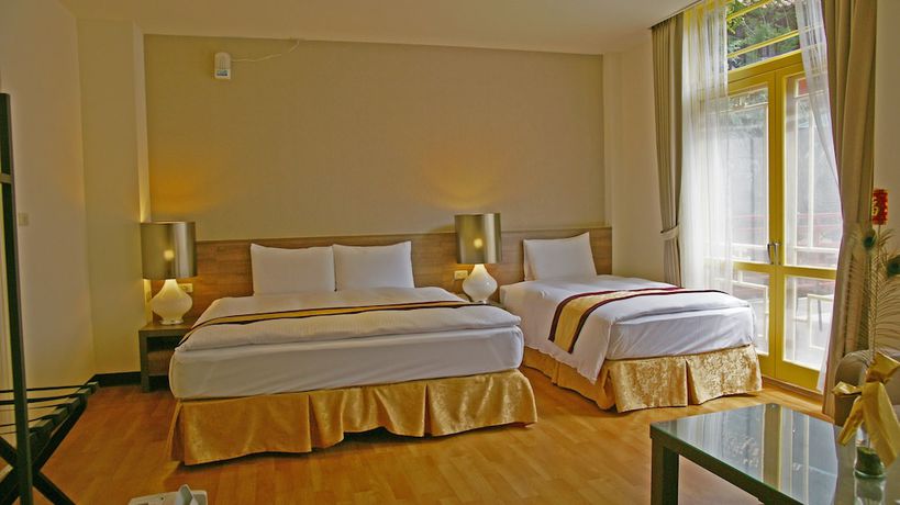 Imagen de la habitación del Hotel Lishan Guest House. Foto 2