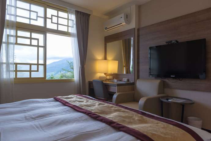 Imagen de la habitación del Hotel Lishan Guest House. Foto 14