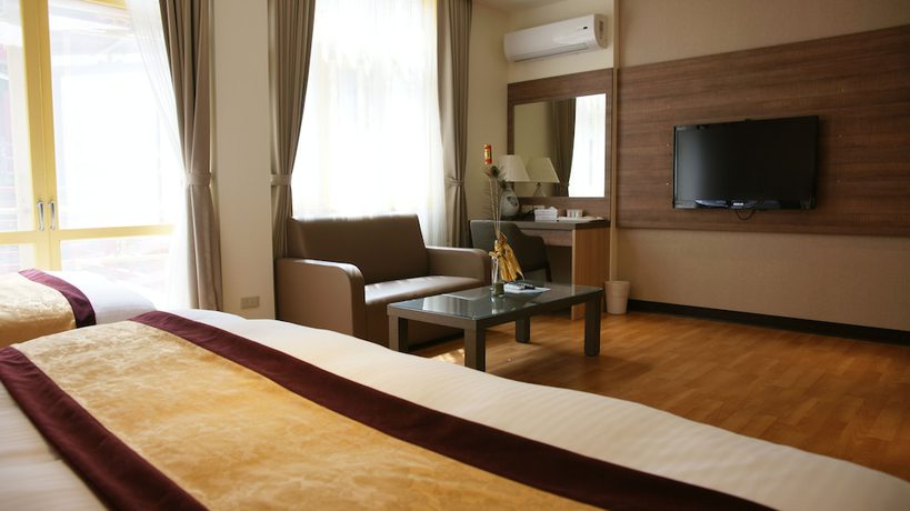 Imagen de la habitación del Hotel Lishan Guest House. Foto 15