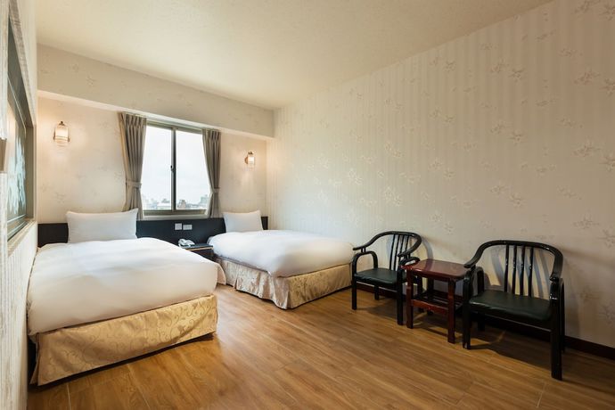 Imagen de la habitación del Hotel Lishin Hotel. Foto 7