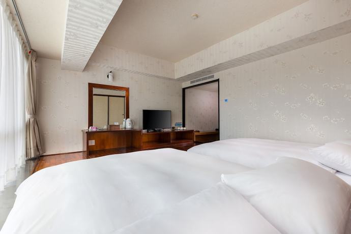 Imagen de la habitación del Hotel Lishin Hotel. Foto 17