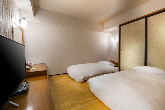 Imagen de la habitación del Hotel Lishin Hotel. Foto 18