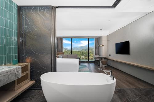 Imagen de la habitación del Hotel Lishui Marriott. Foto 19