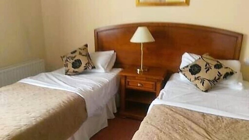 Imagen de la habitación del Hotel Lismar Guest House. Foto 15