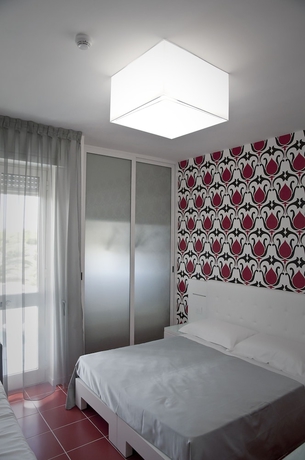 Imagen de la habitación del Hotel L'isola Di Pazze Resort. Foto 4