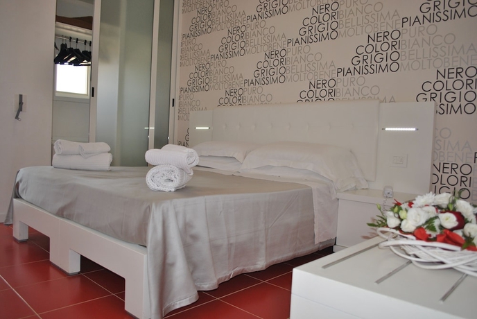 Imagen de la habitación del Hotel L'isola Di Pazze Resort. Foto 14