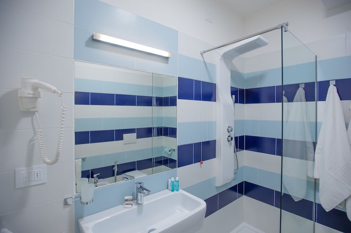 Imagen de la habitación del Hotel L'isola Di Pazze Resort. Foto 18