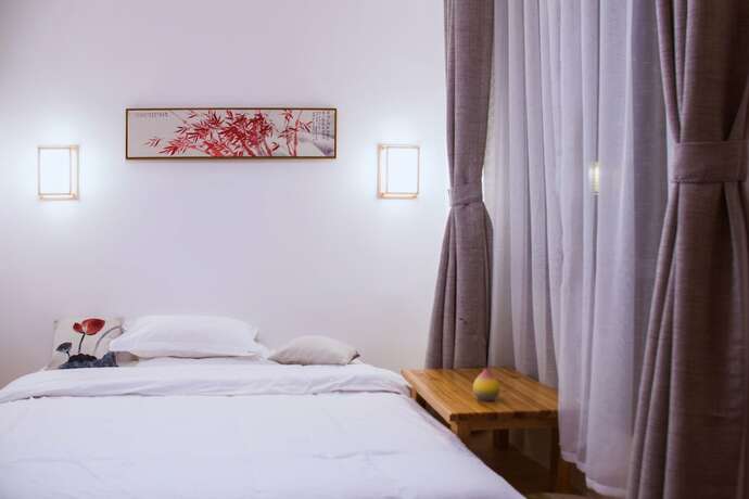 Imagen de la habitación del Hotel Listening To The Rain Hall Inn. Foto 12