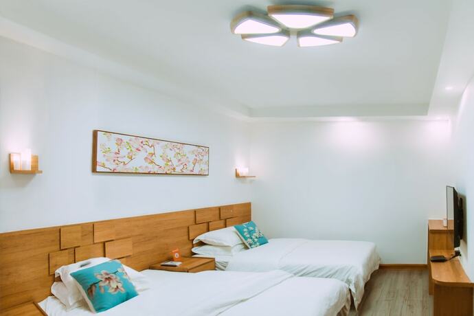 Imagen de la habitación del Hotel Listening To The Rain Hall Inn. Foto 15