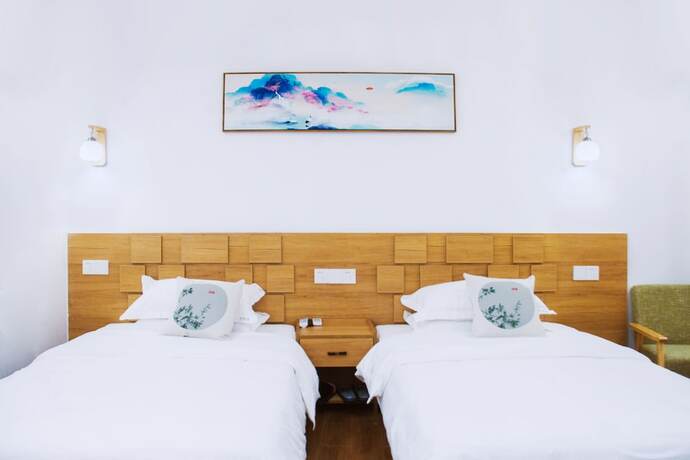 Imagen de la habitación del Hotel Listening To The Rain Hall Inn. Foto 16