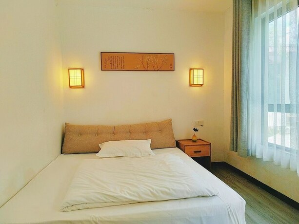 Imagen de la habitación del Hotel Listening To The Rain Hall Inn. Foto 20