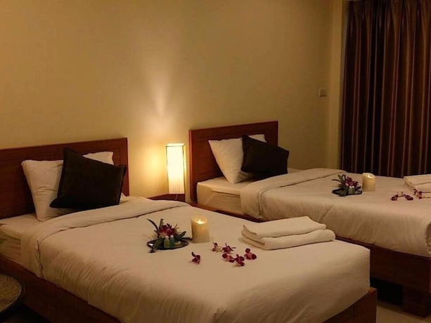 Imagen de la habitación del Hotel Lita Place. Foto 5