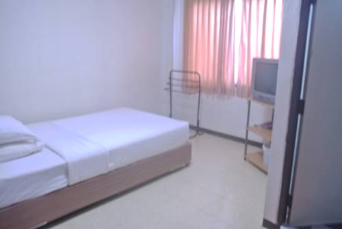 Imagen de la habitación del Hotel Lithai Guesthouse. Foto 7