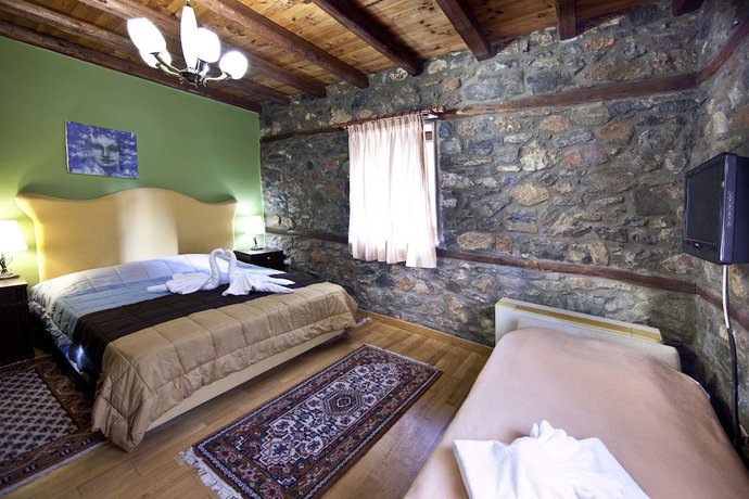 Imagen de la habitación del Hotel Lithos Hotel and Spa. Foto 6