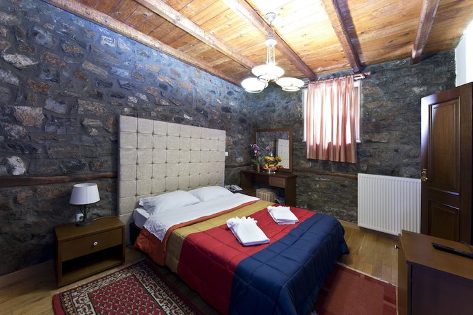 Imagen de la habitación del Hotel Lithos Hotel and Spa. Foto 11