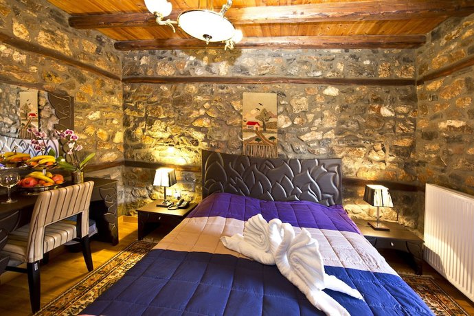 Imagen de la habitación del Hotel Lithos Hotel and Spa. Foto 16