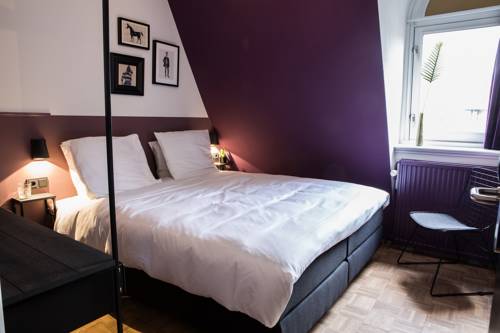 Imagen de la habitación del Hotel Little Duke. Foto 4