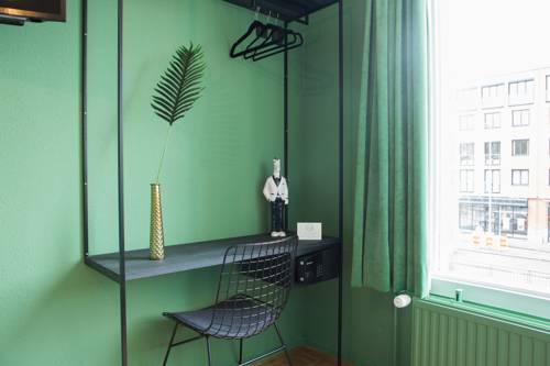 Imagen de la habitación del Hotel Little Duke. Foto 15