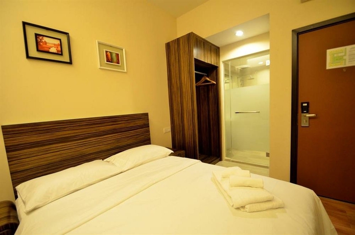 Imagen de la habitación del Hotel Little Gaya. Foto 10
