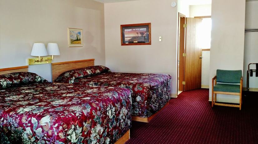 Imagen de la habitación del Hotel Little HiltInns EGM. Foto 18