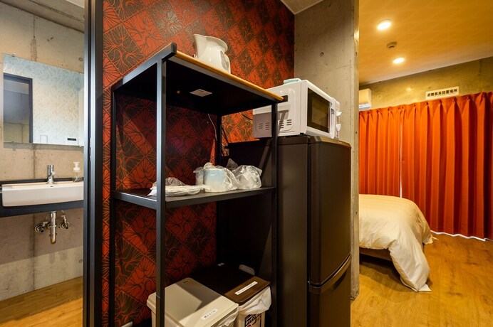 Imagen de la habitación del Hotel Little Island Okinawa Matsuyama. Foto 23