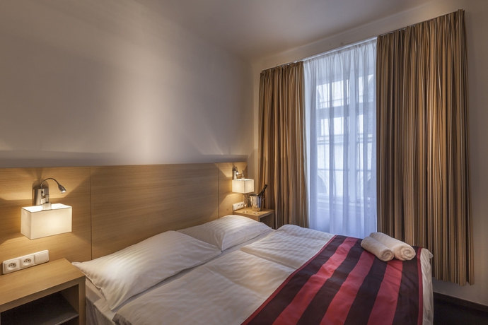 Imagen de la habitación del Hotel Little King U Malvaze. Foto 14